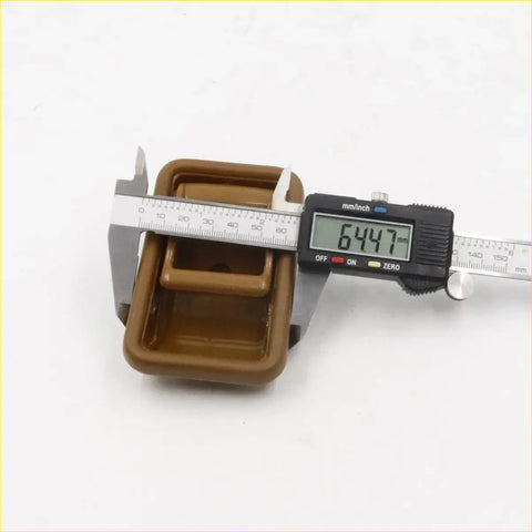 Brown plastic rectangular container with handle measured at 64.47 mm for tan bezel door handles mazda bravo models