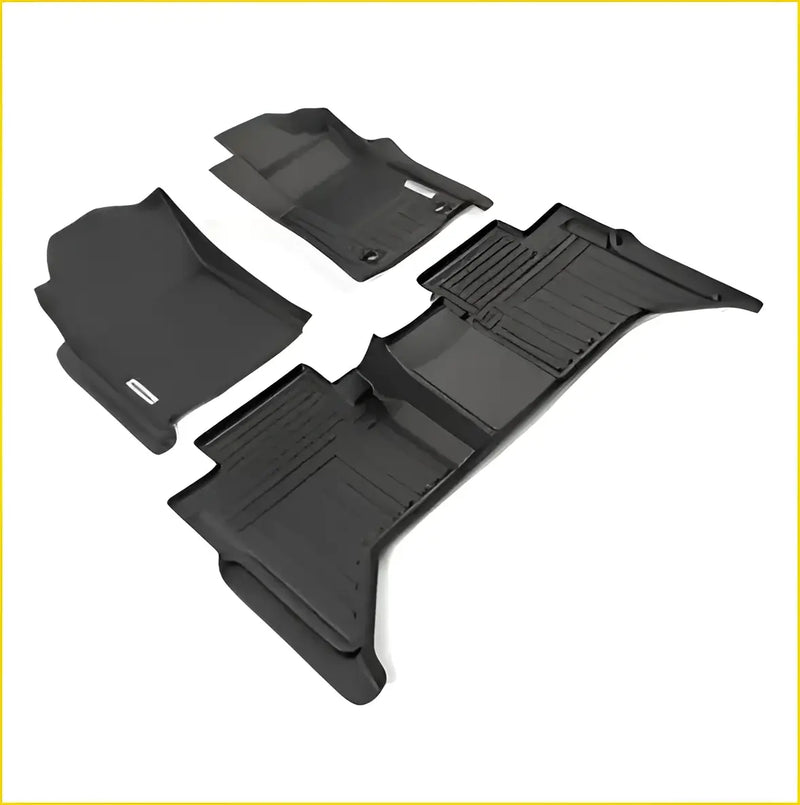 Black rubber Toyota Hilux 8th gen deep dish floor mats with textured ribbed surfaces and molded contours for perfect fit