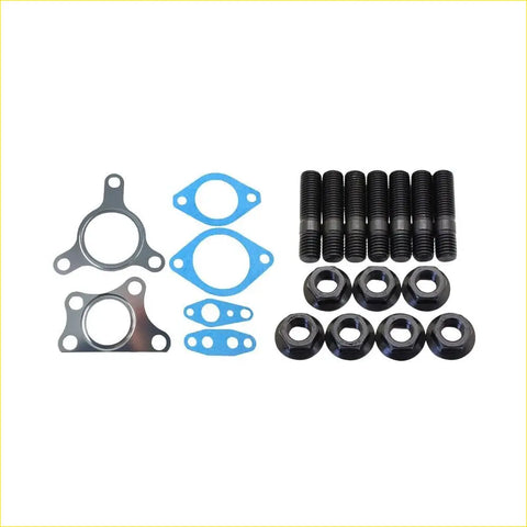 Black threaded bolts and hex nuts with silver metal gaskets and blue rubber seals for turbo install on nissan navara d40