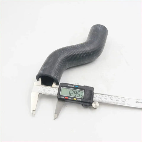 Black rubber upper radiator hose with ribbed texture and curved shape for nissan datsun 510 1600 sss bluebird sedan