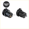 Black plastic usb socket car charger with quick charge showing ribbed texture and metallic prongs on the back side