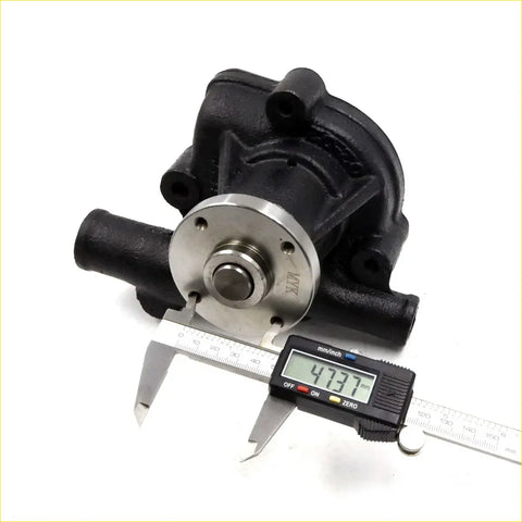 Black cast iron water pump with polished stainless steel hub marked mix for nissan navara d21 1985-1997 back view