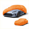 Bright orange waterproof all weather cotton car cover fitting snugly over a toyota gr86 2022 2023