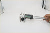 Black cylindrical windscreen washer jet nozzle for datsun nissan 620 measured 25.80 mm with digital caliper