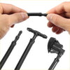 Black plastic windshield washer nozzle and hose assembly kit for Toyota Sienna Solara Tacoma shown from back side