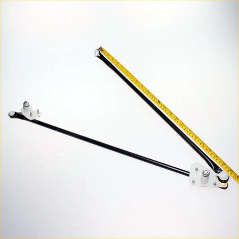 Black metal adjustable wall-mounted wiper link bracket with white plastic end caps and measuring tape for mitsubishi triton l200 colt strada 1986-1996