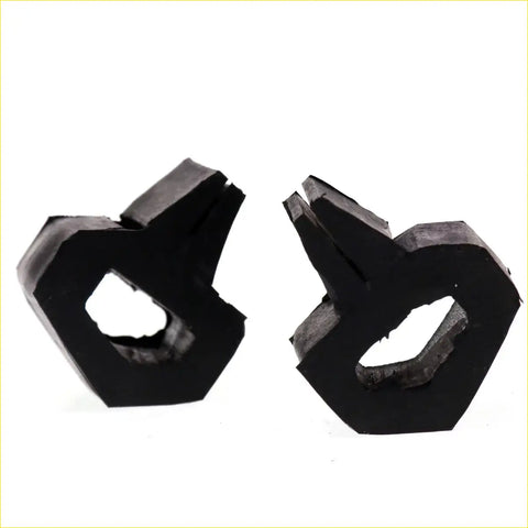 Black rubbery heart-shaped bonnet rubber bumpers with jagged edges and central hole for Nissan Datsun 720 1980-1986