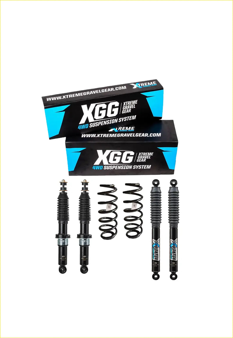 Black xgg 4wd suspension system with coiled springs and shock absorbers in front of branded packaging for ford ranger px3 leveling kit