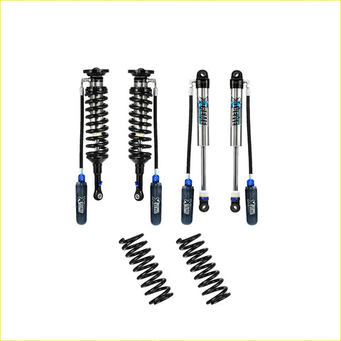 Set of four black and silver xrex shock absorbers with blue accents and two black coil springs for jeep gladiator jt lift kit