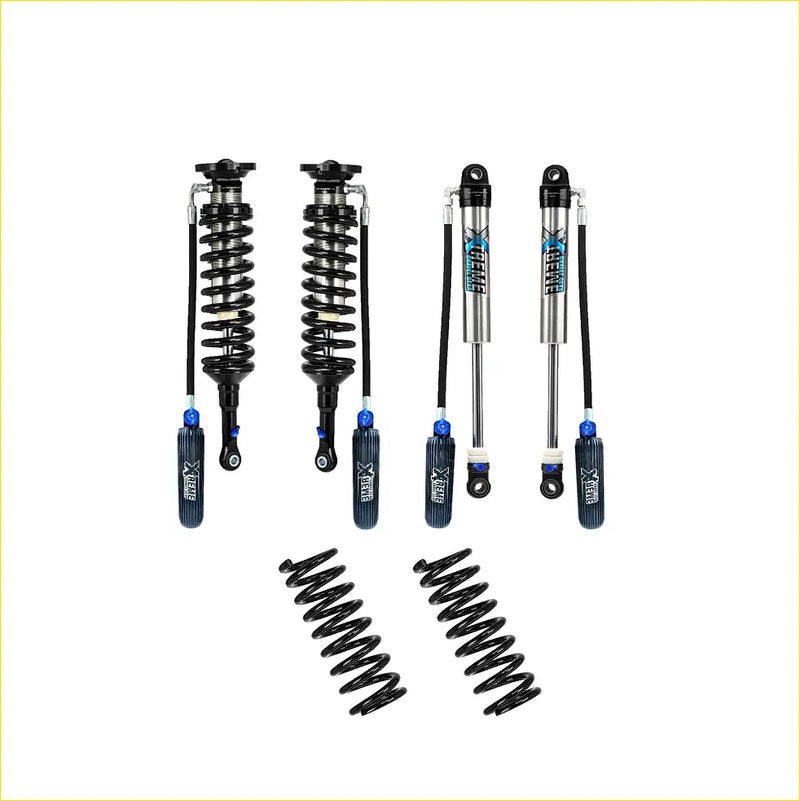 Set of four black and silver xrex shock absorbers with blue accents and two black coil springs for suzuki jimny lift kit